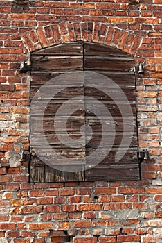 Old wall with closed door