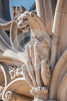 Old wall figure of scary dragon at main facade of Justice Palace in Magdeburg, Germany
