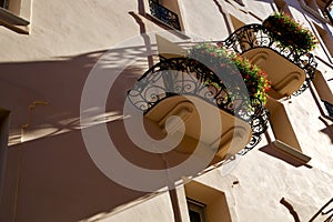 Old wall and flower terrace in the centre city lugano Switzer