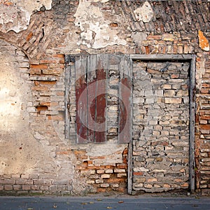 Old wall with immured window