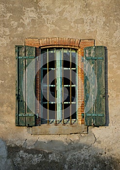 Old wall with old volets, Badens, Minervois, France photo