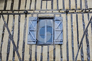 Old wall with Open shutters