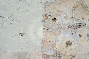 Old Wall With Peel Grey Stucco Texture. Retro Vintage Worn Wall Background. Decayed Cracked Rough Abstract Banner