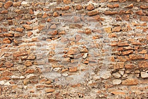 Old Wall of Red Bricks and White Brayed and Cracked Old Paint. Red, Terracotta and White Brick Background. Old Wall for Background