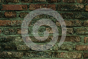 Old wall of red briks, background