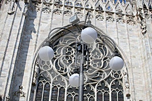 Old wall street lighting, in the old town, Milan, Italy