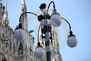 Old wall street lighting, in the old town, Milan, Italy