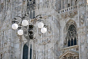 Old wall street lighting, in the old town, Milan, Italy