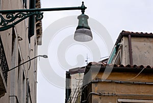 Old wall street lighting, in the old town, Venice, Italy