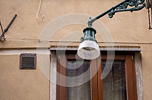 Old wall street lighting, in the old town, Venice, Italy