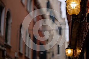 Old wall street lighting, in the old town, Venice, Italy