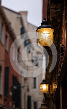 Old wall street lighting, in the old town, Venice, Italy