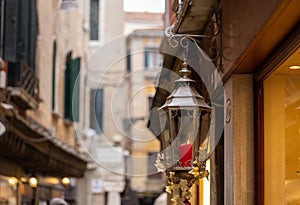 Old wall street lighting, in the old town, Venice, Italy