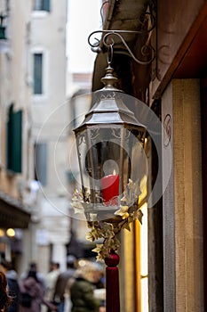 Old wall street lighting, in the old town, Venice, Italy