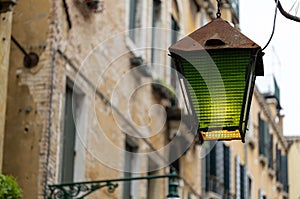 Old wall street lighting, in the old town, Venice, Italy