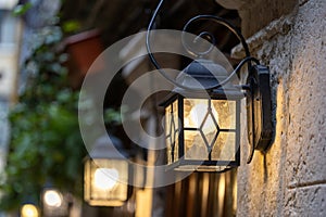 Old wall street lighting, in the old town, Venice, Italy