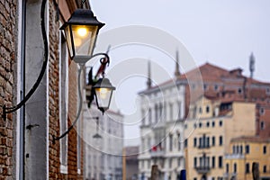 Old wall street lighting, in the old town, Venice, Italy