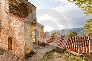 Old walls with arches of Orthodox monastery in Alazani valley, Georgia. Nekresi monastery