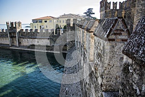 Old walls around Sirmione, italian town on Lake Garda