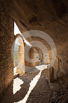 Old walls built close to the rock at Santo Spirito at Maiella