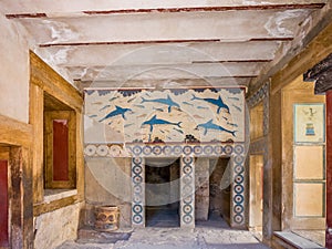 Old walls with Dolphin fresco, symbol of minoan culture. Knossos palace ruins at Crete island, Greece. Famous Minoan palace of