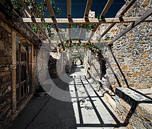 Old walls and pergolas. Greece. Crete.