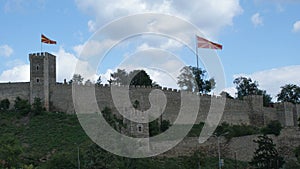 Old war fort with flags and from stone photo