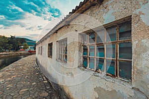 Old warehouse building with broken windows