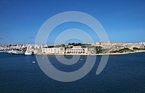 The old warehouses and Fort Tigne on the point in Sliema, Malta