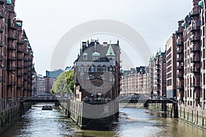 Old warehouses next to a canal in HafenCity, Hamburg, Germany