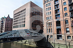 Old warehouses next to a canal in HafenCity, Hamburg, Germany