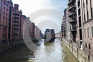 Old warehouses next to a canal in HafenCity, Hamburg, Germany