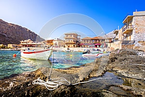 Old warehouses in the small port of Gerolimenas village, Mani region, Lakonia, Peloponnese.