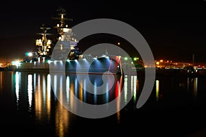 Old warship at night