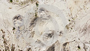 Old waste rock dumps of ilmenite quarry, vertical aerial view