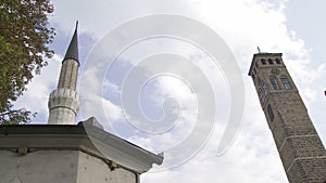 Old watch tower and minaret of Gazi Husrev mosque