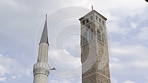 Old watch tower and minaret of Gazi Husrev mosque
