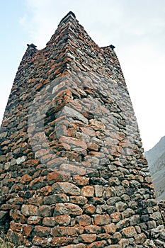 Old watchtower and defensive tower in the mountain gorge of Ossetia