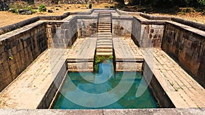Old water bath at Kavaledurga Fort, Shimoga, Karnataka photo