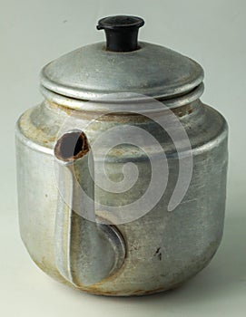 Old iron tea pot