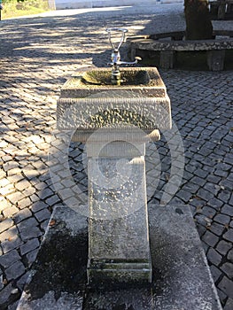 Old water drinker in Fatima shrine.