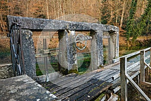 Old water gate for the hammermill at the karst spring `Blautopf` in Blaubeuren