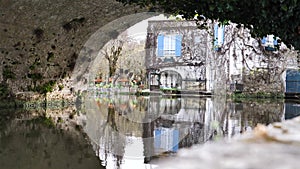 Old water mill, mill wheel on the rive