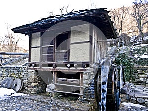 Old water mill-wheel building