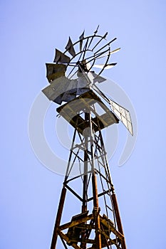 Old water pumping windmill, California