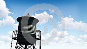 Old water tower against blue cloudy sky