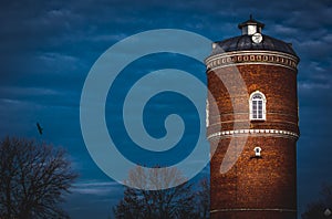 Old water tower against the sky