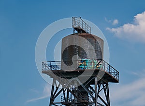 Old water tower of a paper factory