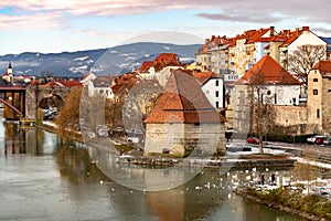 Old Water tower Vodni Stolp in Maribor city in Slovenia. Scenic view of medieval fortified tower, Old State bridge and