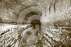 The old water tunnel, mined caves. The cave. Sandstone tunnel moistened walls.